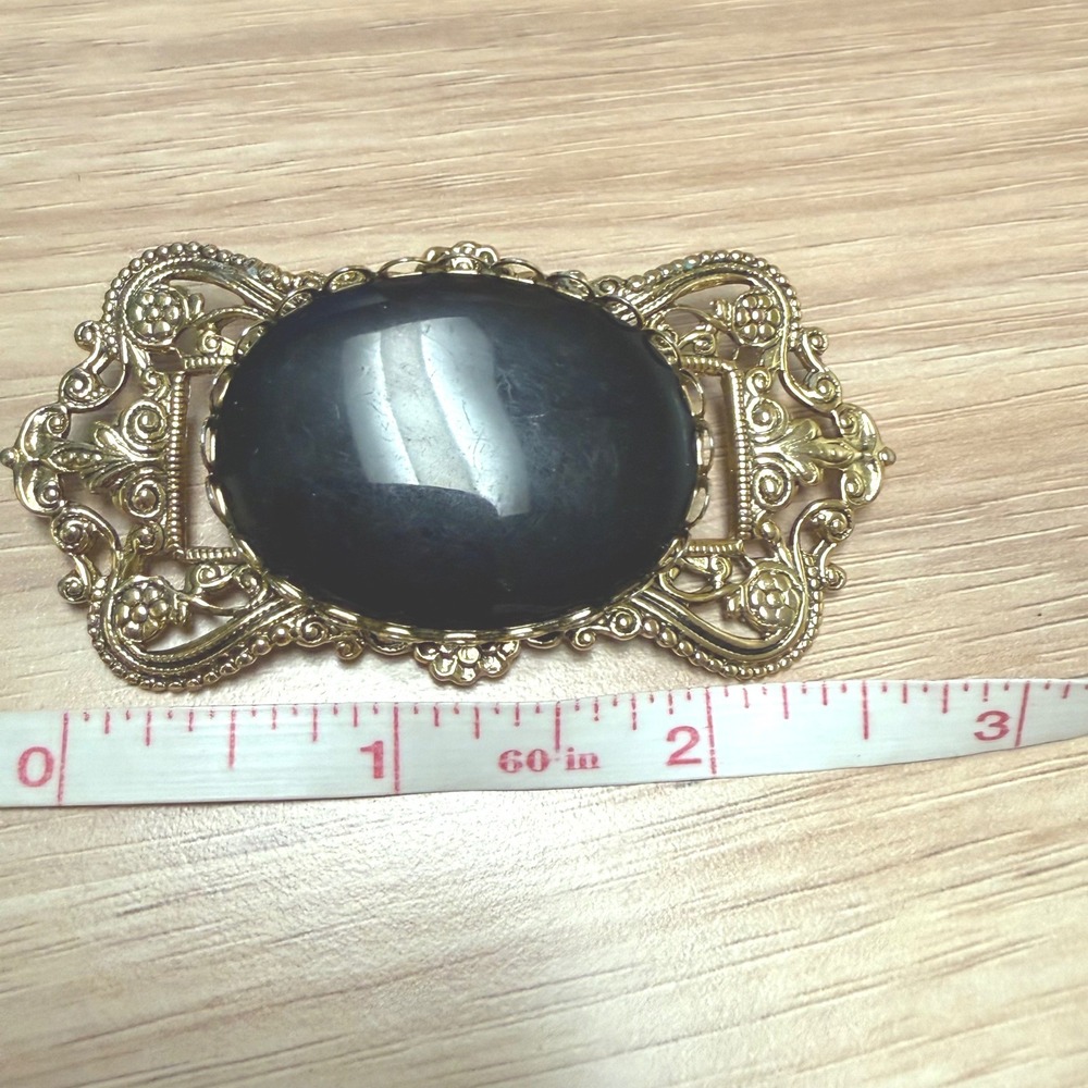 Vintage Gold Tone Ornate Filigree Brooch with Large Black Oval Cabochon